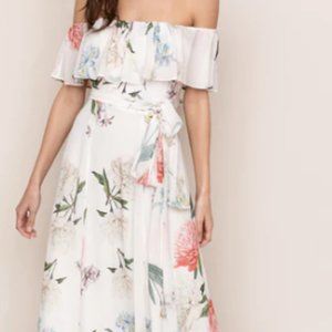 Yumi Kim Carmen Maxi Dress in Size Small. Neutral background with floral print.